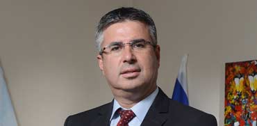 עו"ד רו"ח משה אשר / צילום: איל יצהר